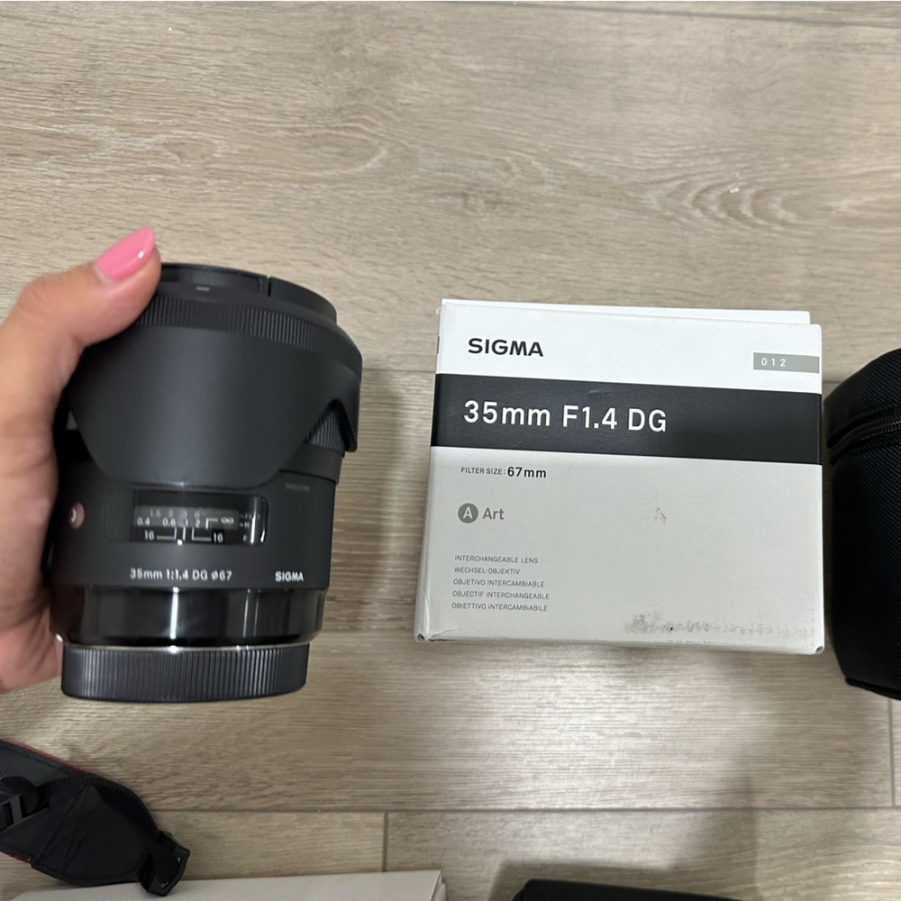 sigma lense 35mm F1.4 + backpack, docking station